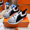 HERMES DEPART SLIP-ON SNEAKER IN WHITE MIX BLACK KNIT AND BLACK CALFSKIN