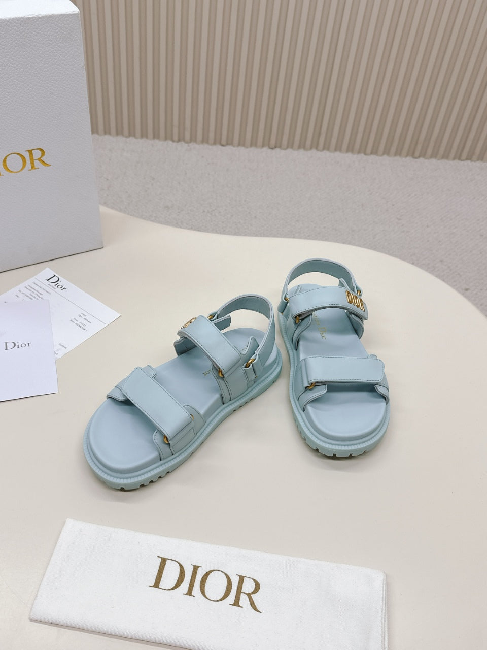 DIOR BACK-STRAP SANDALS 25S IN PASTEL BLUE CALFSKIN WITH GOLD HARDWARE