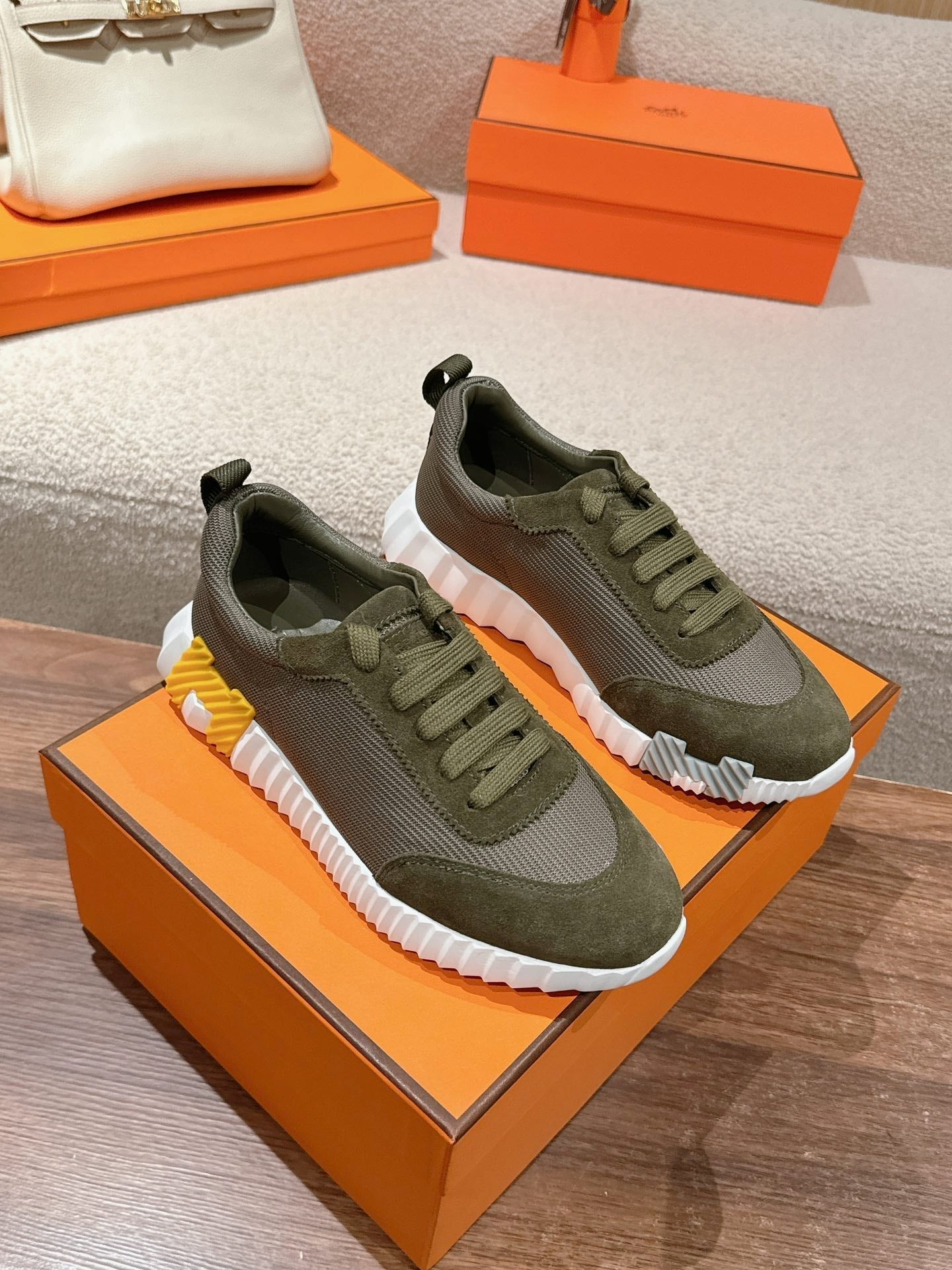 HERMES MAINLAND SNEAKER IN ARMY GREEN SUEDE AND BREATHABLE MESH FABRIC