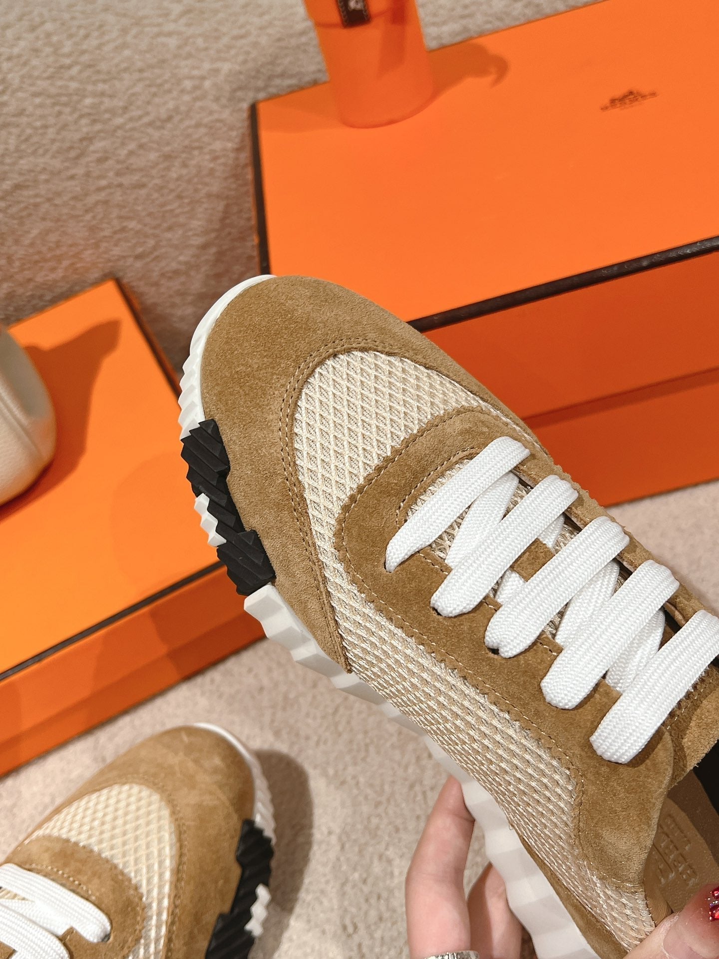 HERMES MAINLAND SNEAKER IN PEANUT BROWN SUEDE AND WHITE BREATHABLE MESH FABRIC