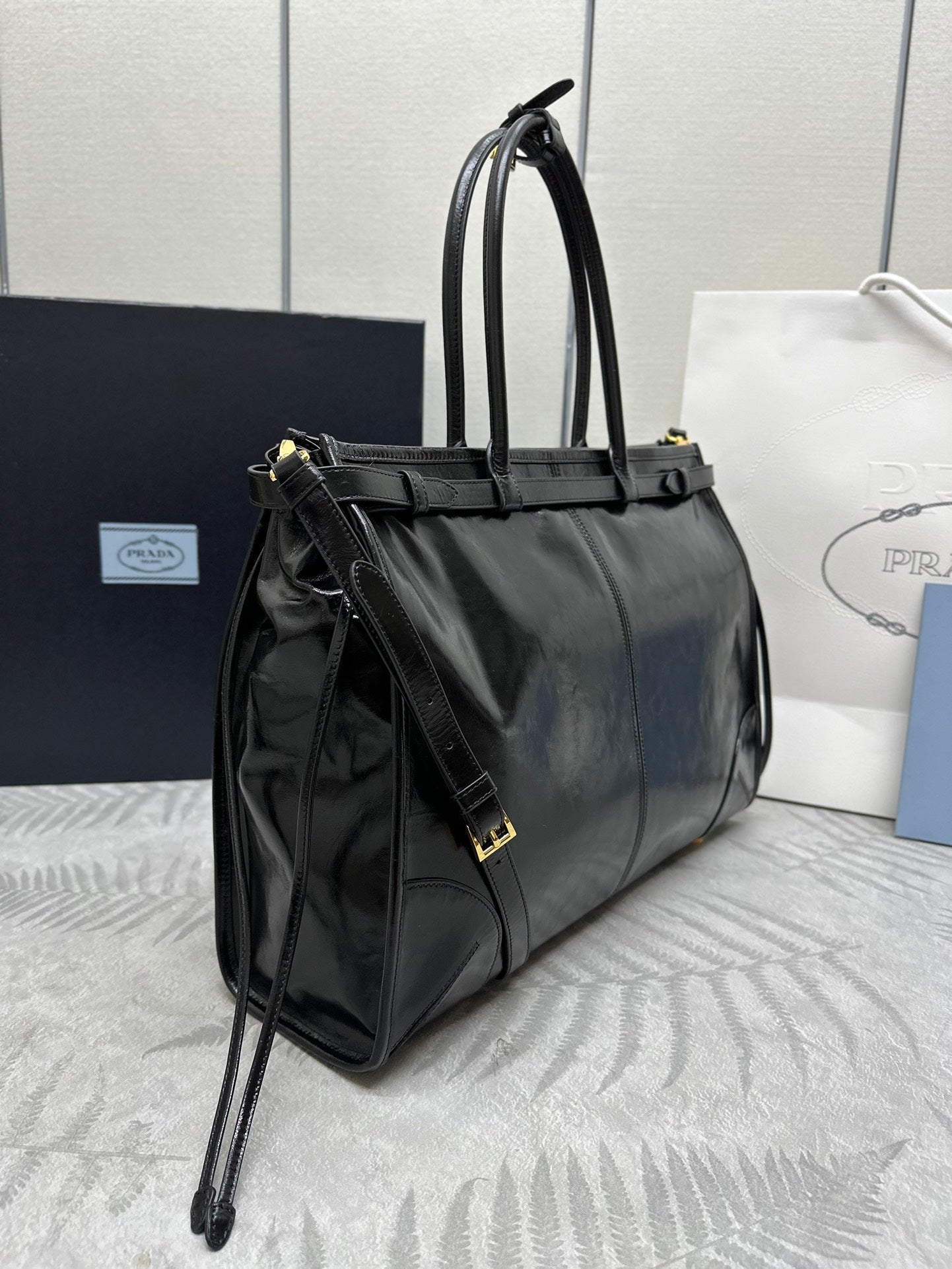 PRADA TOTE BAG WITH BELT 42 IN BLACK OIL WAX LAMBSKIN GOLD HARDWARE