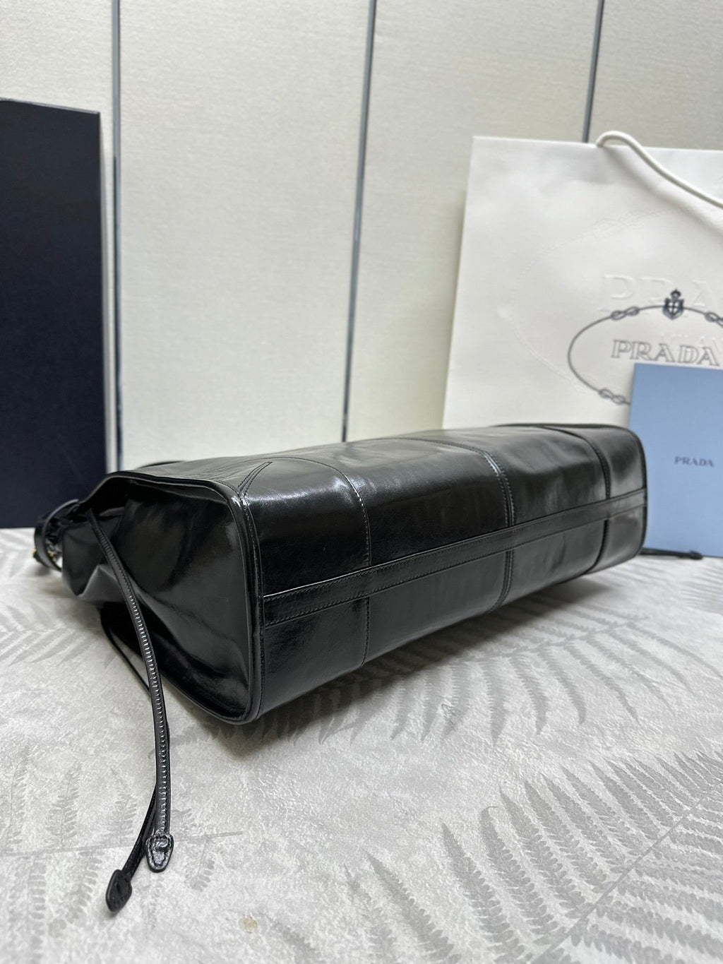 PRADA TOTE BAG WITH BELT 42 IN BLACK OIL WAX LAMBSKIN GOLD HARDWARE