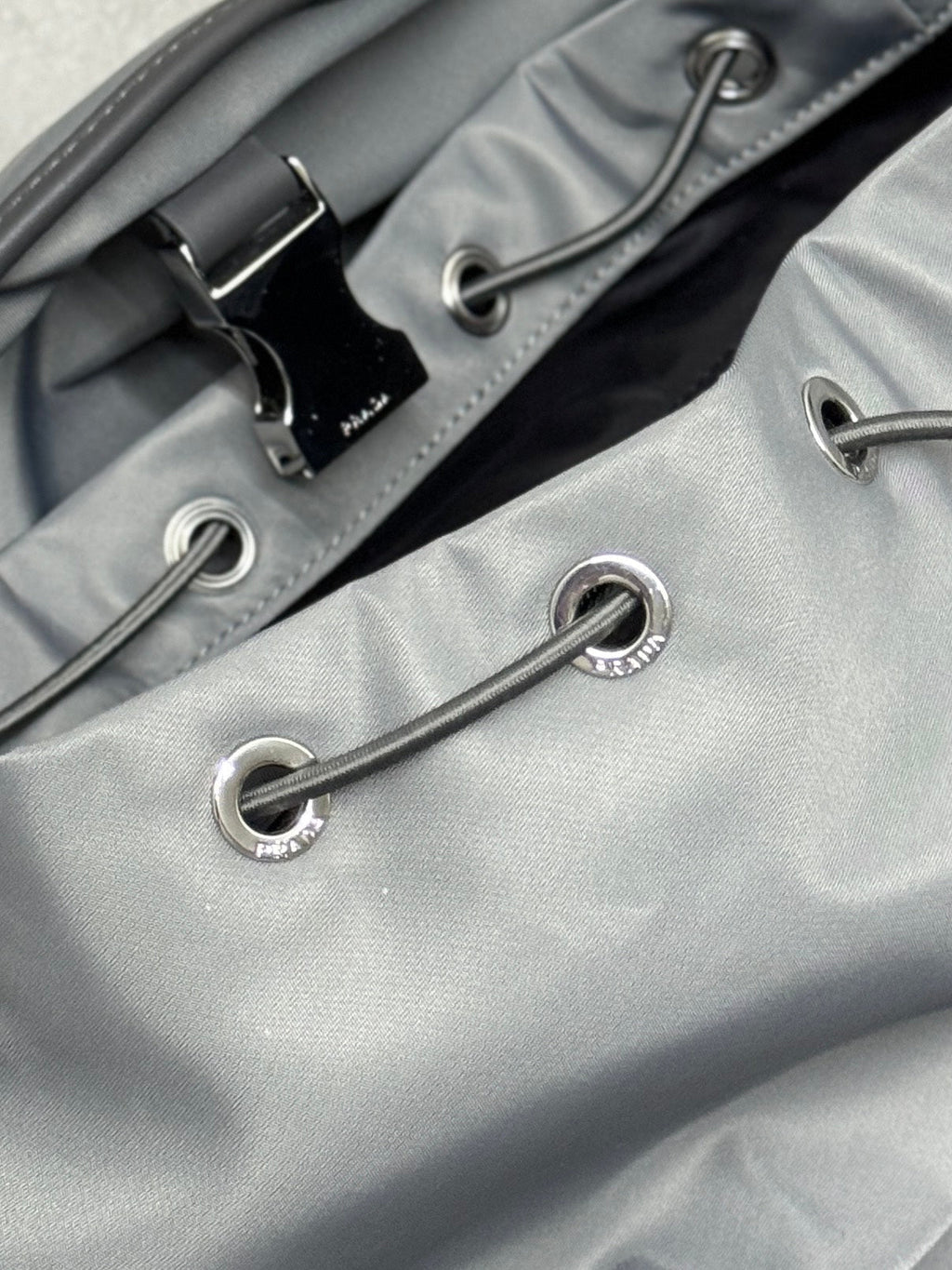 PRADA TRIANGLE LOGO BACKPACK 42 IN RHINO GRAY RE-NYLON