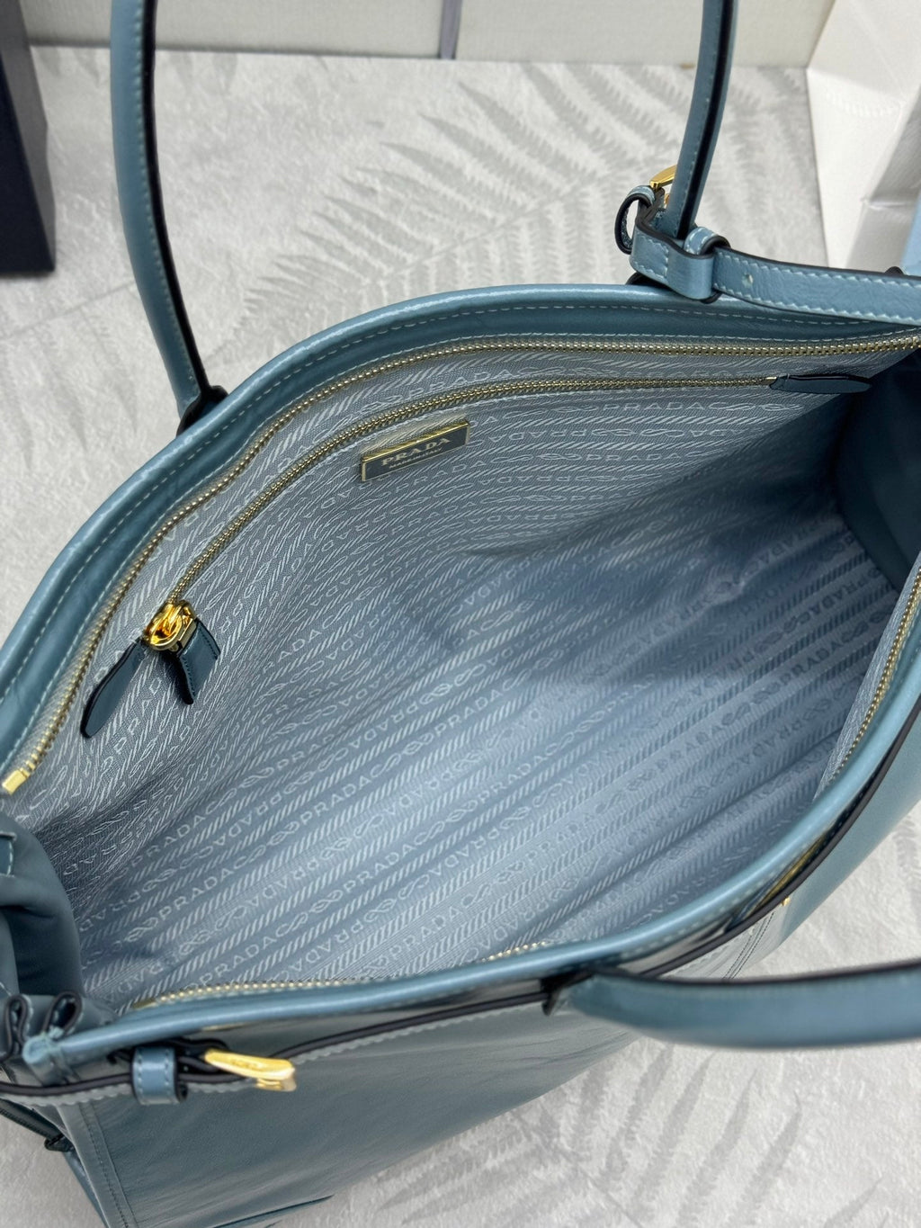 PRADA 25S LUX SOFT BAG 42 IN BLUE GLOSSY CALFSKIN GOLD HARDWARE
