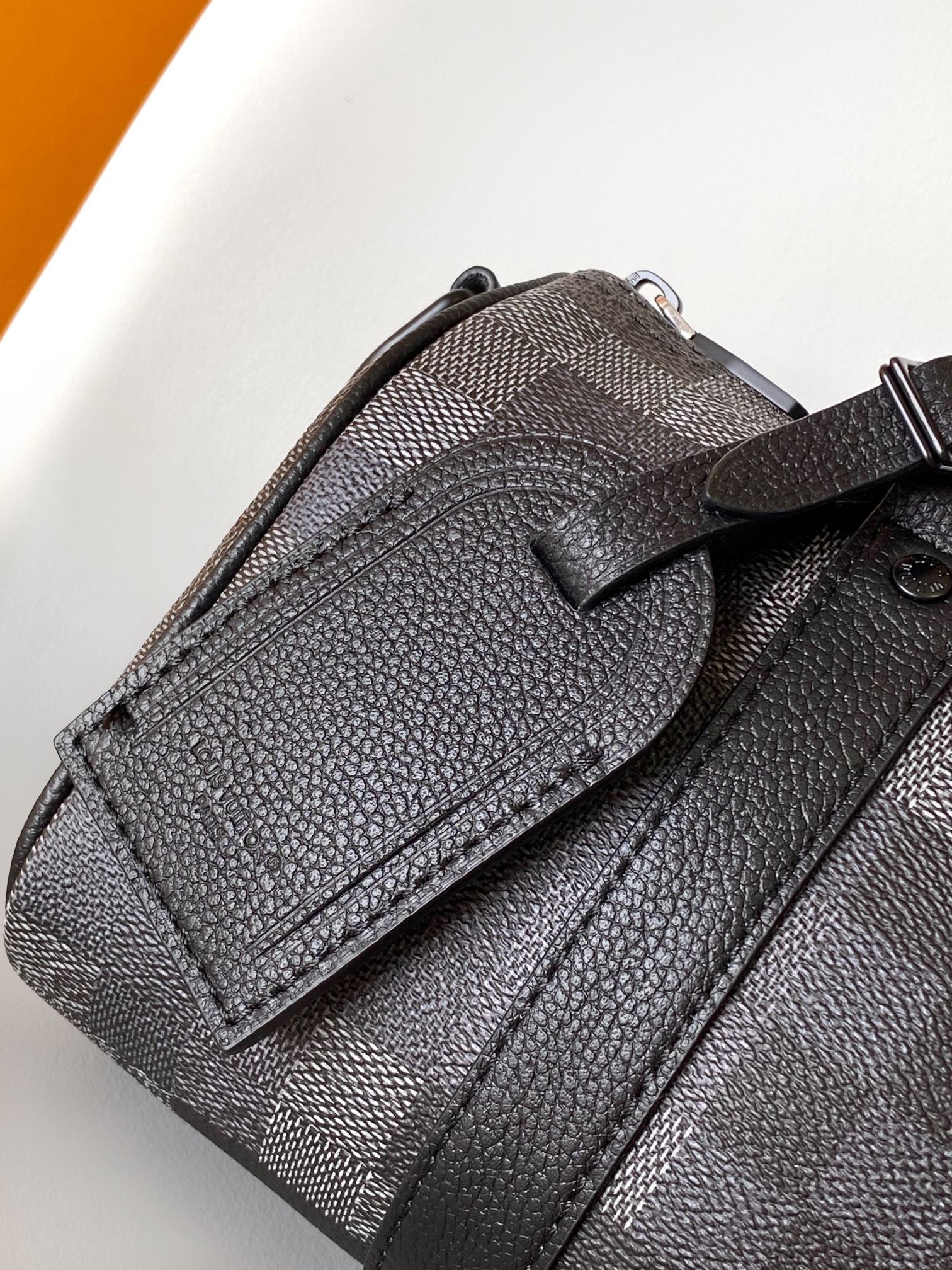 LOUIS VUITTON LV 25S KEEPALL BANDOULIÈRE 25 BAG IN DAMOFLAGE BLACK CALFSKIN