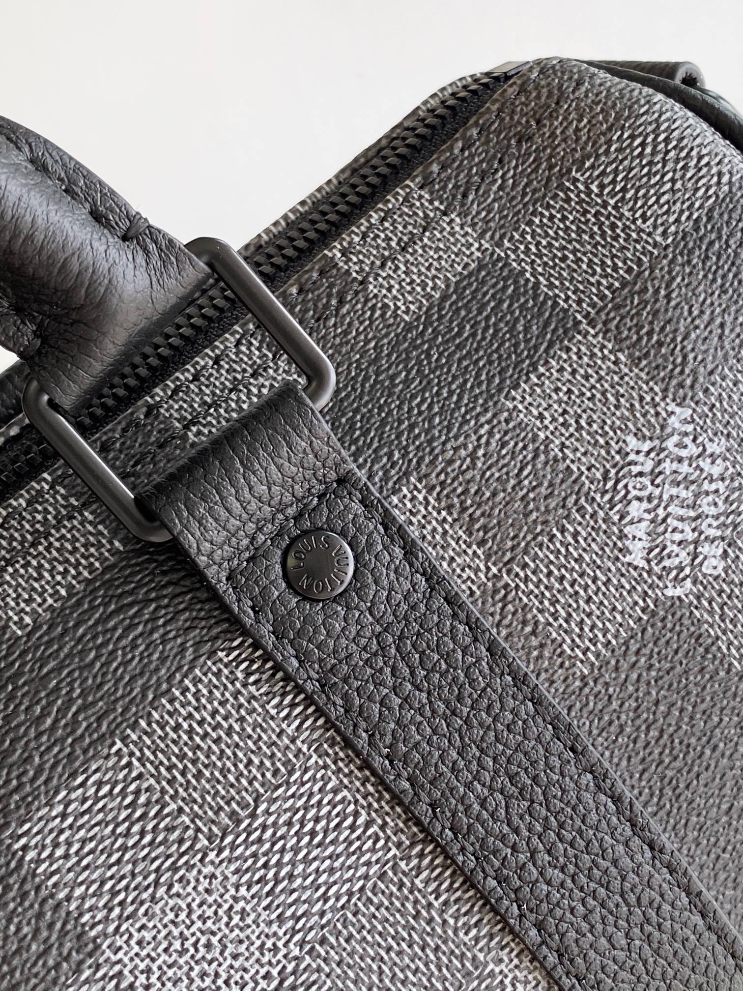 LOUIS VUITTON LV 25S KEEPALL BANDOULIÈRE 25 BAG IN DAMOFLAGE BLACK CALFSKIN