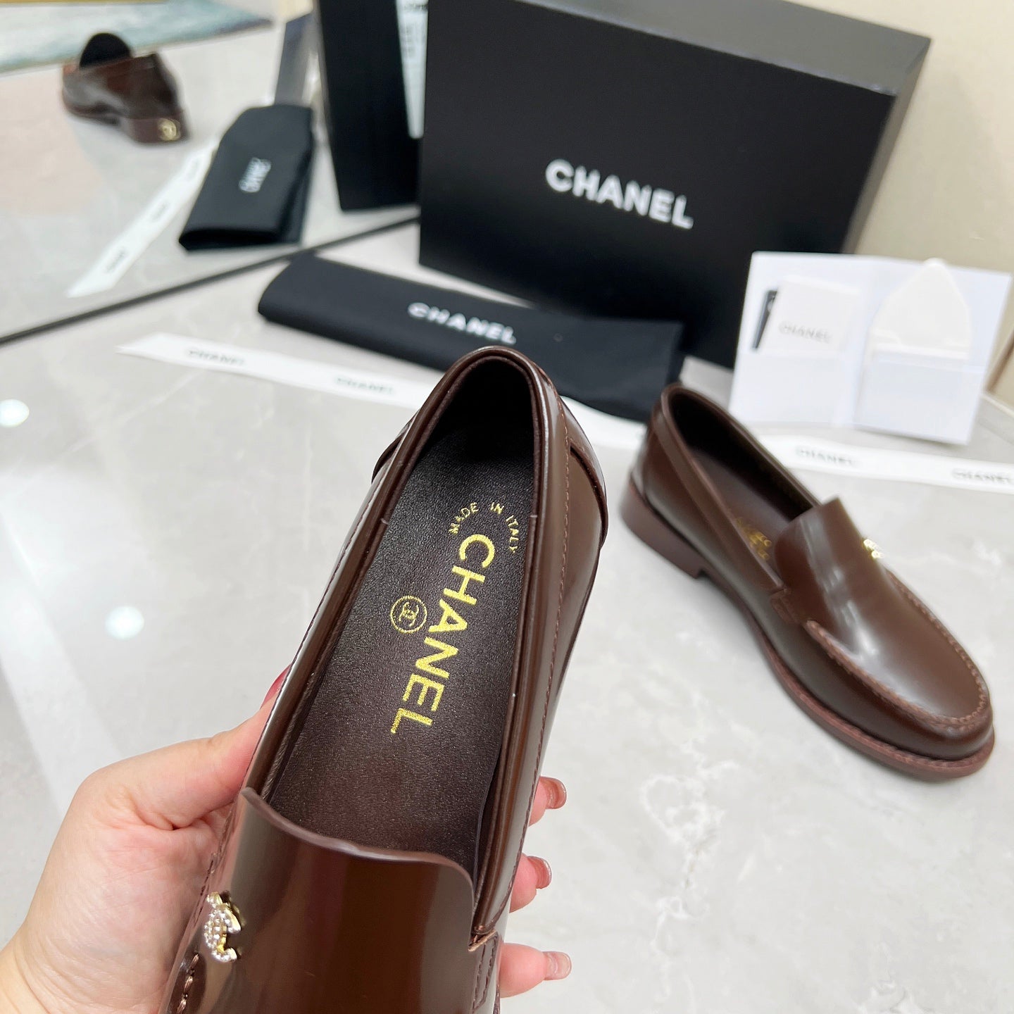 CHANEL MOASINS IN BROWN CALFSKIN