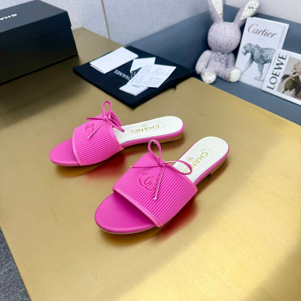 CHANEL BOW SLIPPERS IN BRIGHT PINK LAMBSKIN