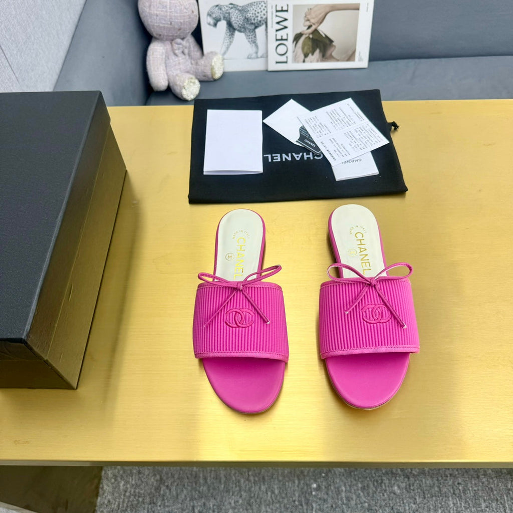 CHANEL BOW SLIPPERS IN BRIGHT PINK LAMBSKIN