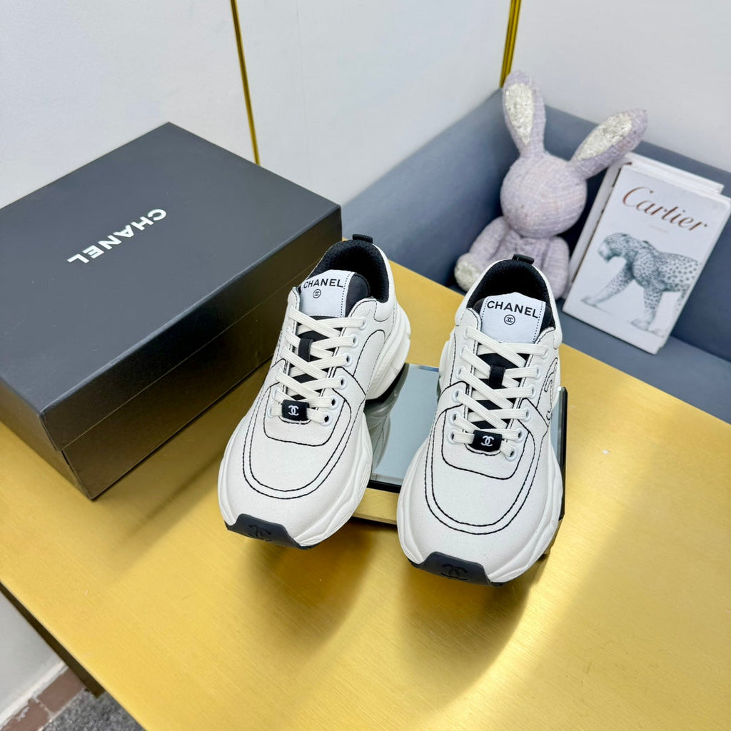 CHANEL SNEAKER IN WHITE MIX BLACK BREATHABLE FABRIC