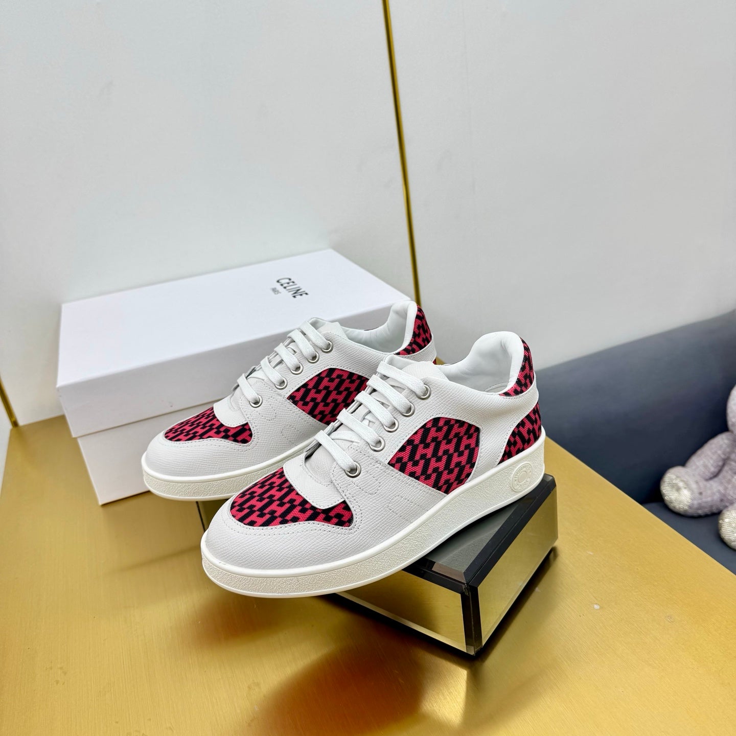 HERMES FREE SNEAKER IN WHITE CALFSKIN AND "H EN BIAIS" RED CANVAS.