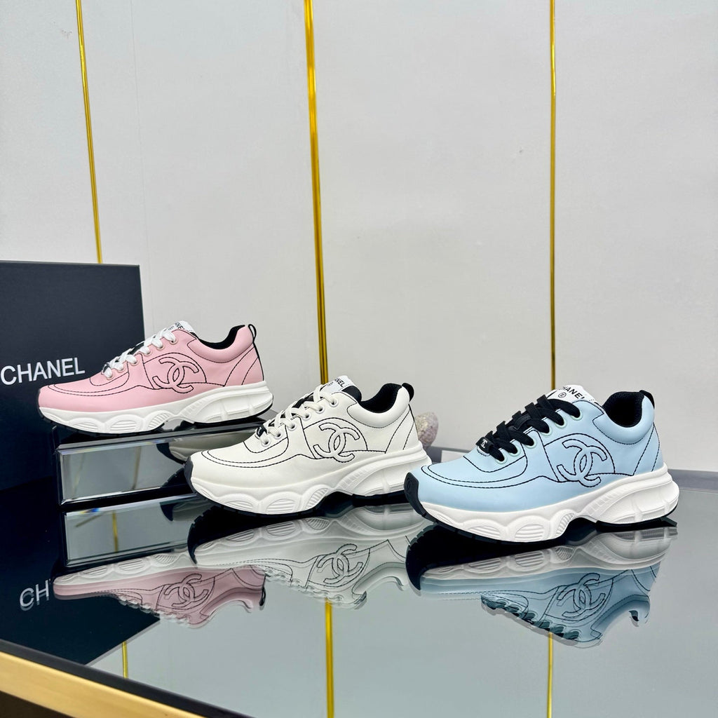 CHANEL TRAINERS SNEAKER IN LIGHT BLUE CALFSKIN WITH BLACK EMBROIDERED