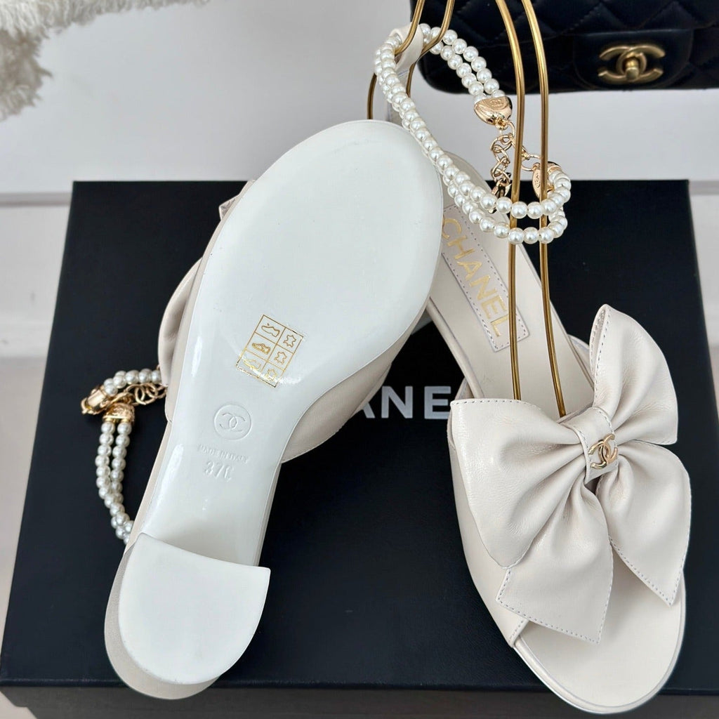 CHANEL Double C Big Bow Pearl Chain High Sandals White Lambskin