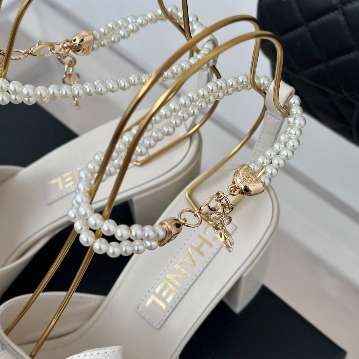 CHANEL Double C Big Bow Pearl Chain High Sandals White Lambskin