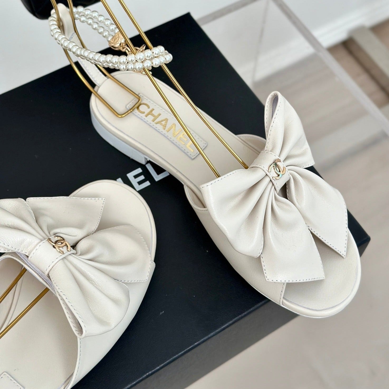 CHANEL Double C Big Bow Pearl Chain Sandals White Lambskin