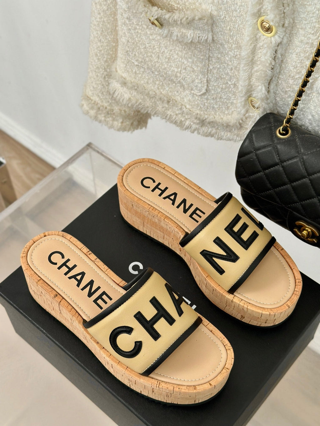 CHANEL THICK SOLE LETTER SLIPPERS IN DARK CREAM SHEEPSKIN