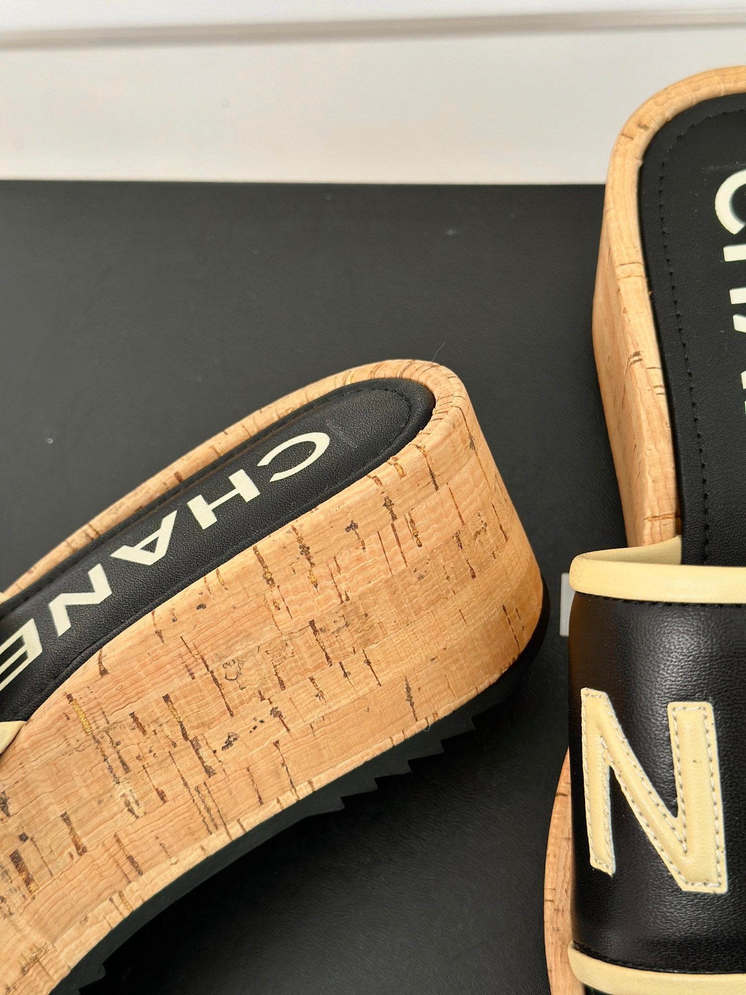CHANEL THICK SOLE LETTER SLIPPERS IN BLACK SHEEPSKIN