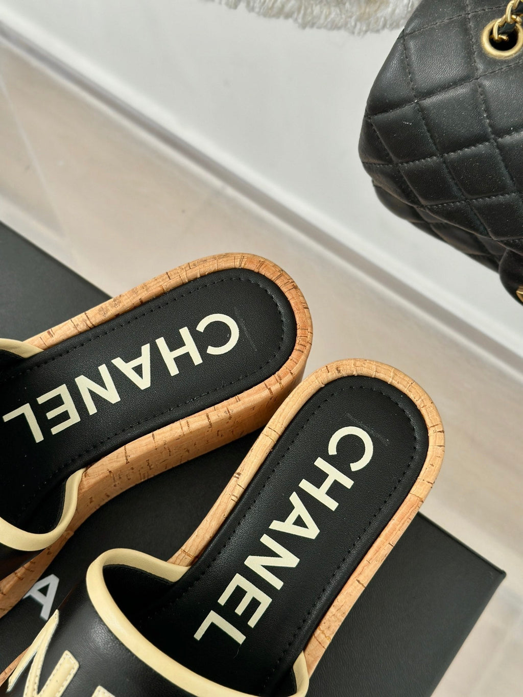 CHANEL THICK SOLE LETTER SLIPPERS IN BLACK SHEEPSKIN