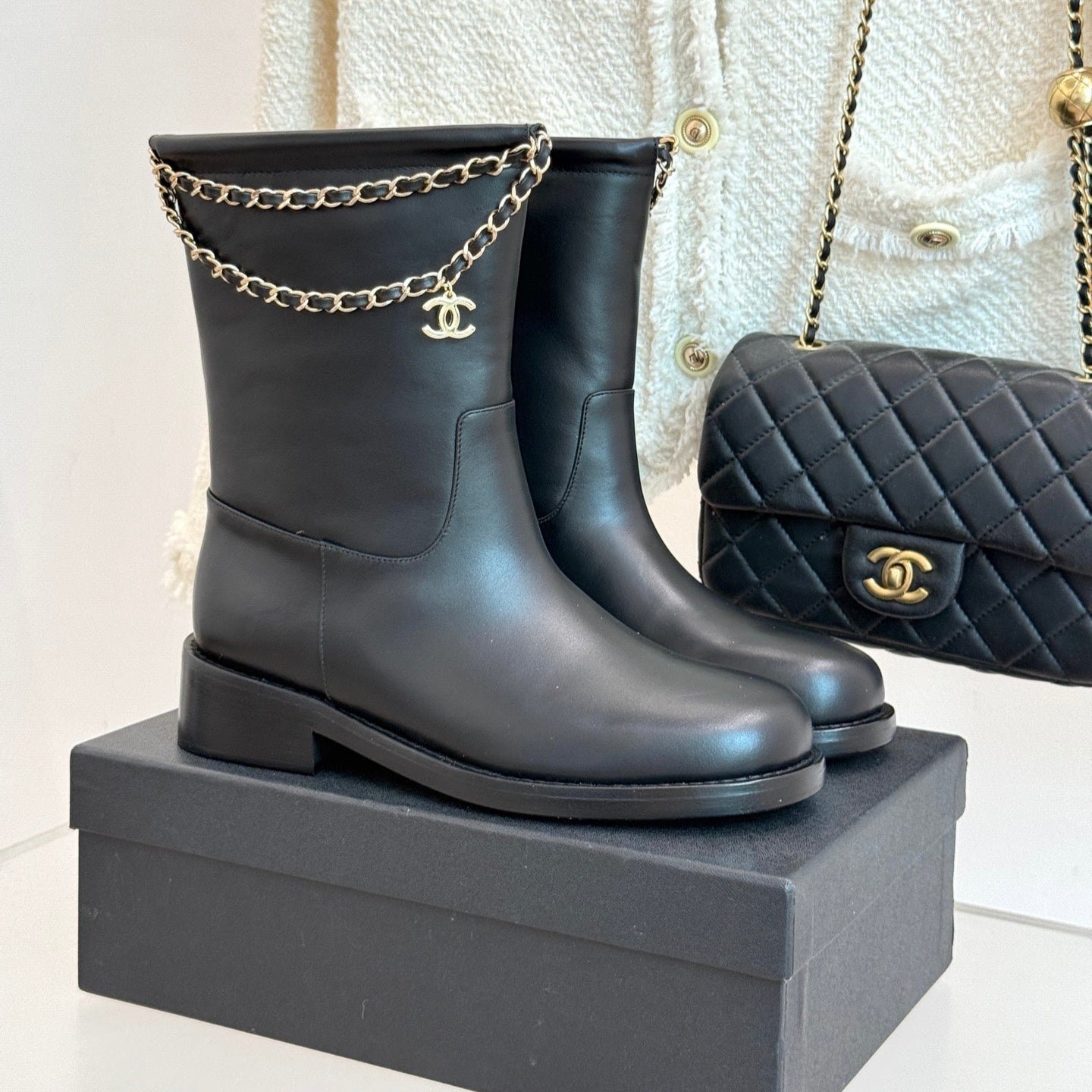 CHANEL SHORT BOOTS IN BLACK CALFSKIN
