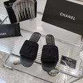 CHANEL SLIPPERS BLACK SHEEPSKIN