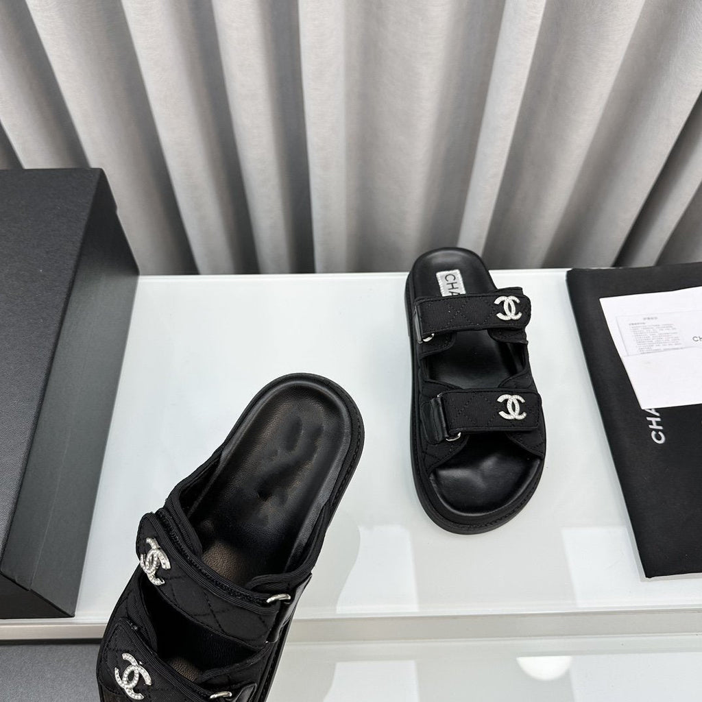 CHANEL dad sandals black textile mules