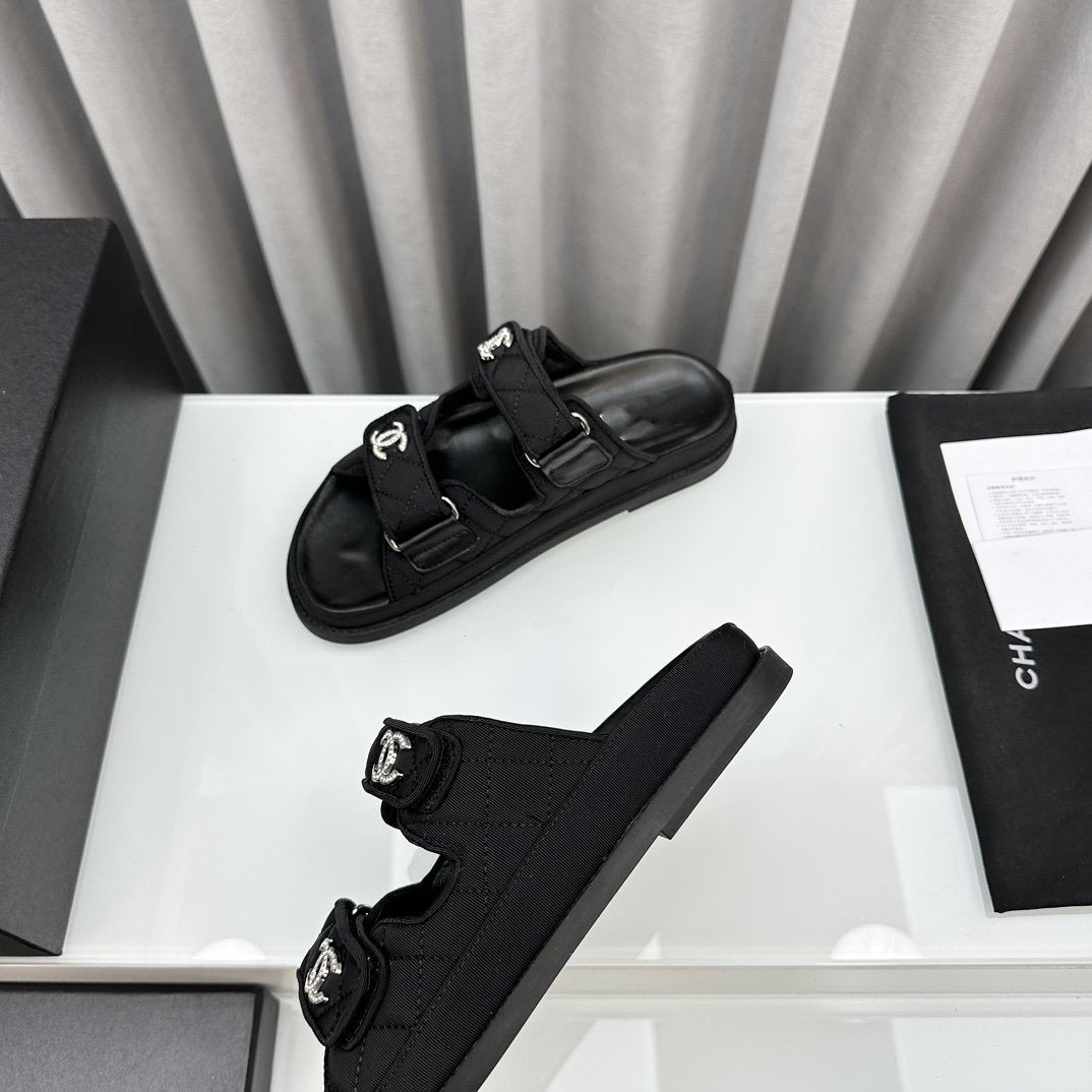 CHANEL dad sandals black textile mules