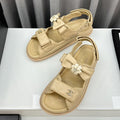 CHANEL dad sandals beige bow tie lambskin