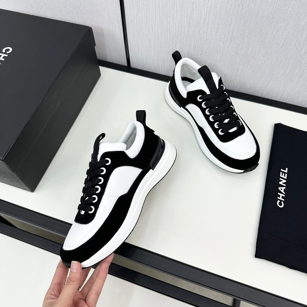 CHANEL SNEAKER IN BLACK SUEDE AND WHITE CALFSKIN