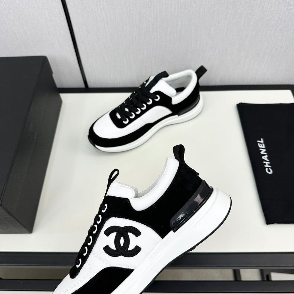 CHANEL SNEAKER IN BLACK SUEDE AND WHITE CALFSKIN