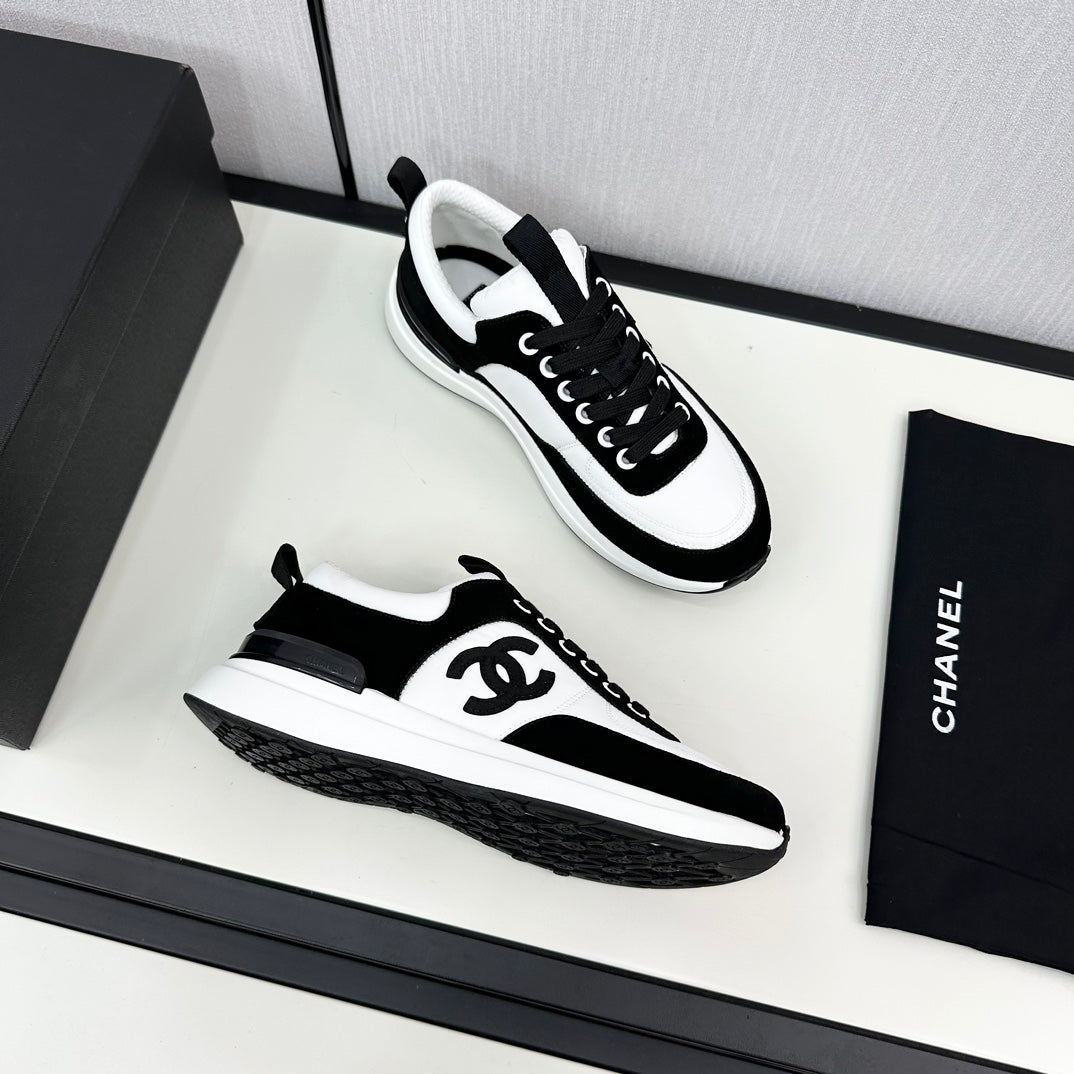 CHANEL SNEAKER IN BLACK SUEDE AND WHITE CALFSKIN