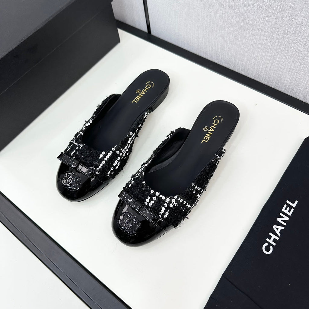 CHANEL BOW MULE IN BLACK MIX WHITE FUR AND CALFSKIN