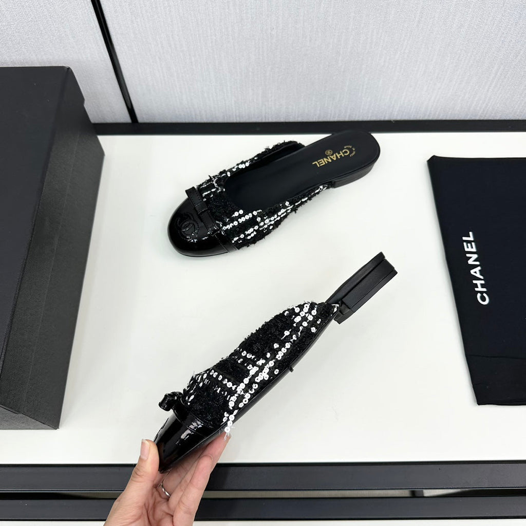 CHANEL BOW MULE IN BLACK MIX WHITE FUR AND CALFSKIN