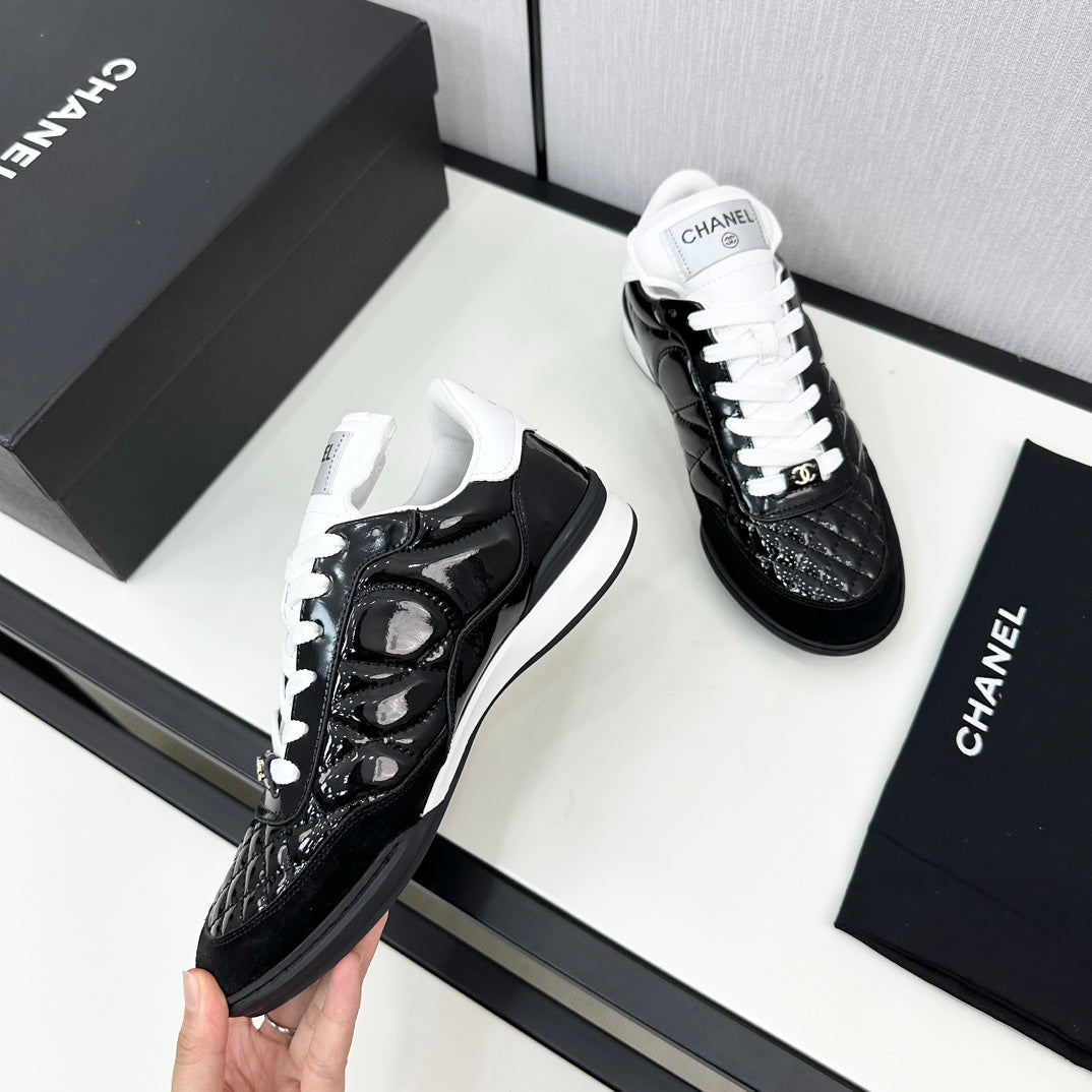 CHANEL SPORTS SHOES IN GLOSSY BLACK CALFSKIN