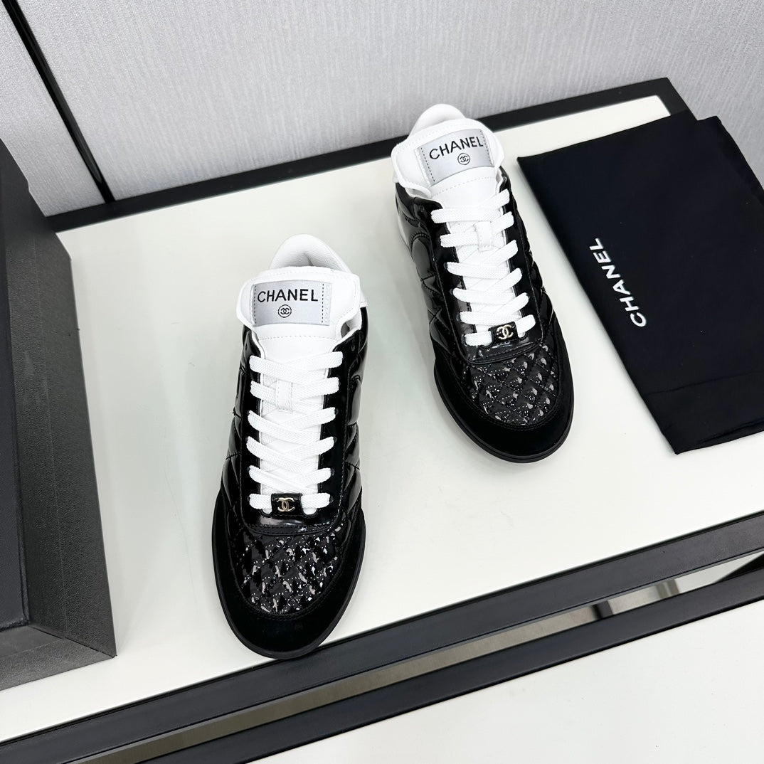 CHANEL SPORTS SHOES IN GLOSSY BLACK CALFSKIN