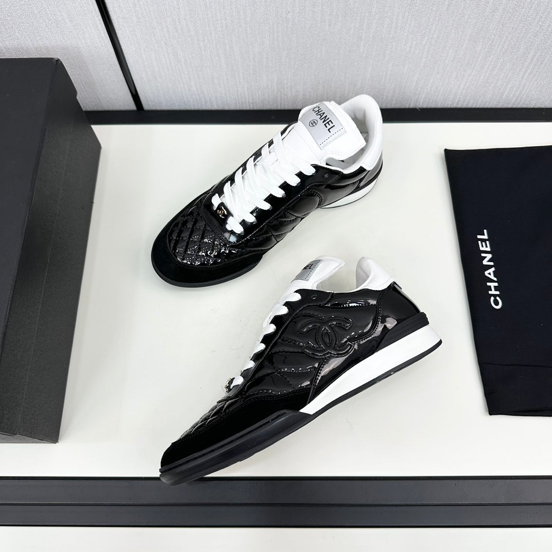 CHANEL SPORTS SHOES IN GLOSSY BLACK CALFSKIN