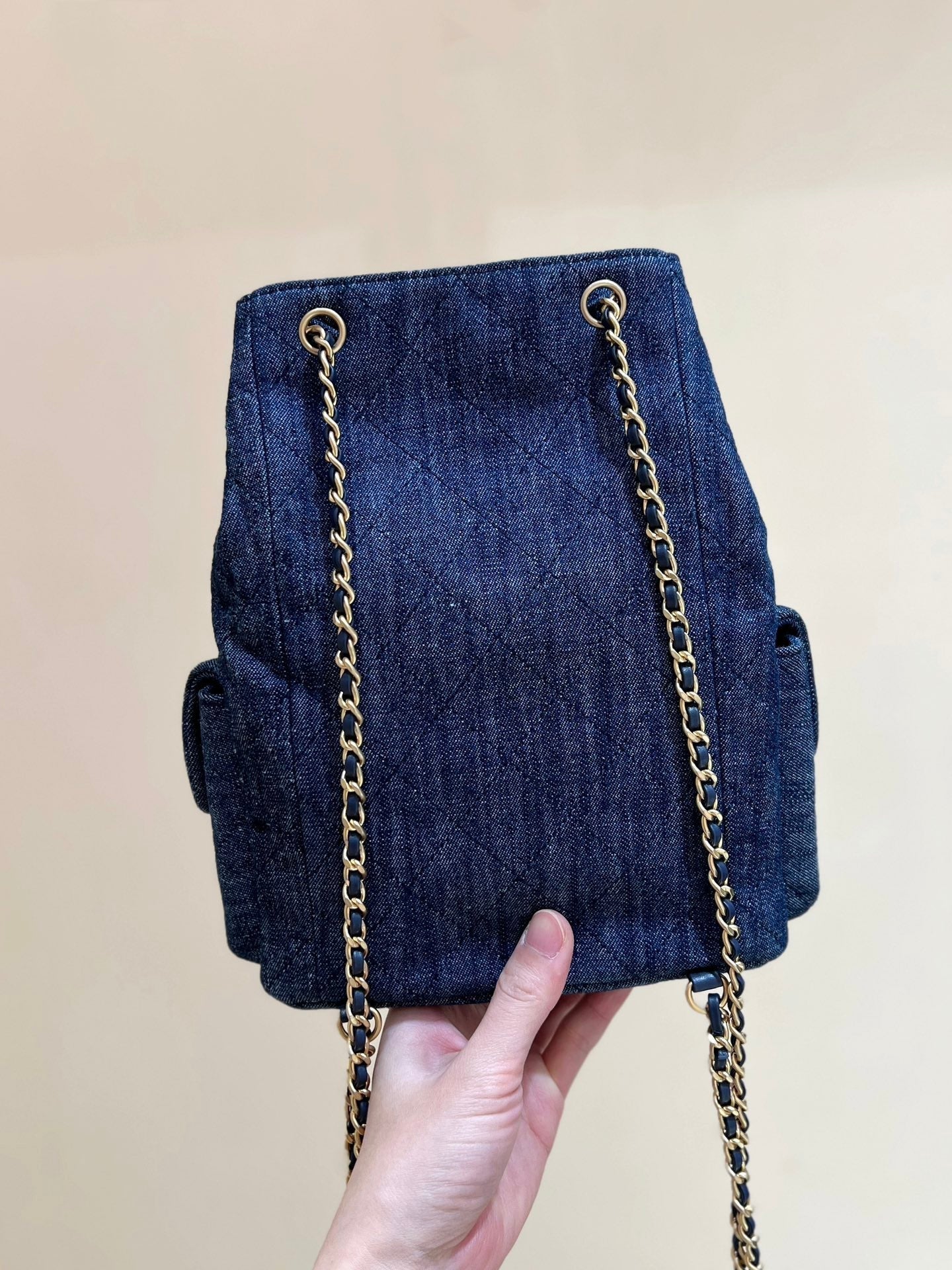 CHANEL DRAWSTRING BUCKET BACKPACK 24 IN DARK BLUE DENIM GOLD HARDWARE