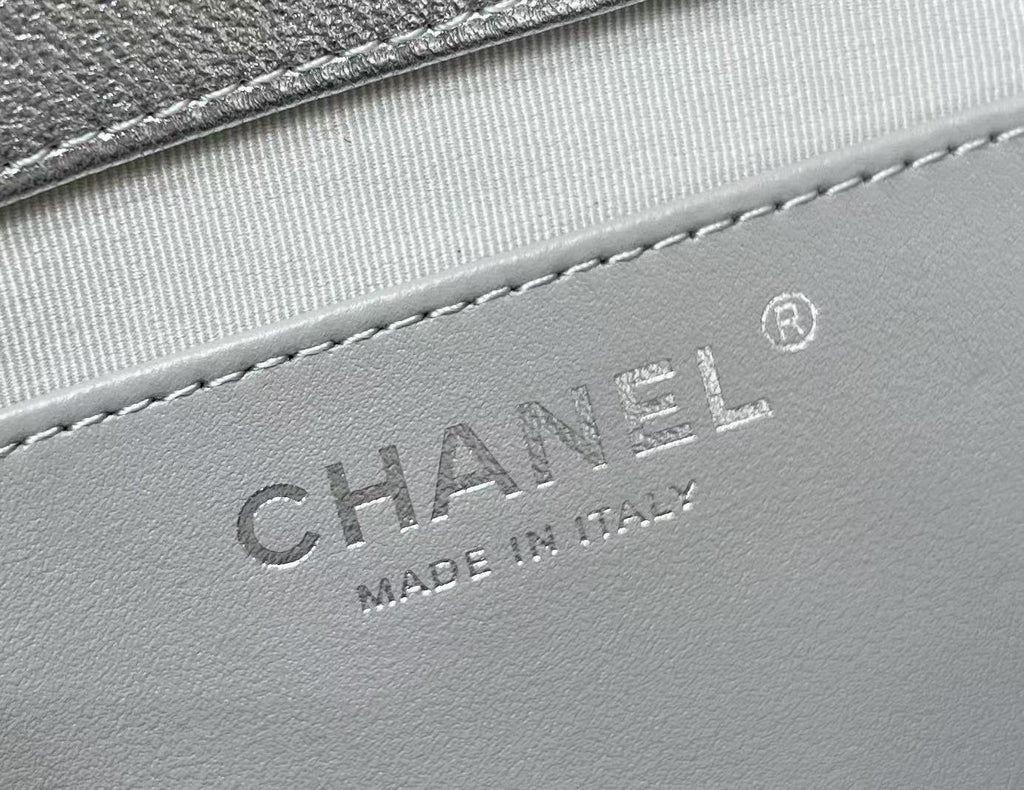 CHANEL DRAWSTRING BUCKET BACKPACK 24 IN SILVER-TONE LAMBSKIN SILVER HARDWARE
