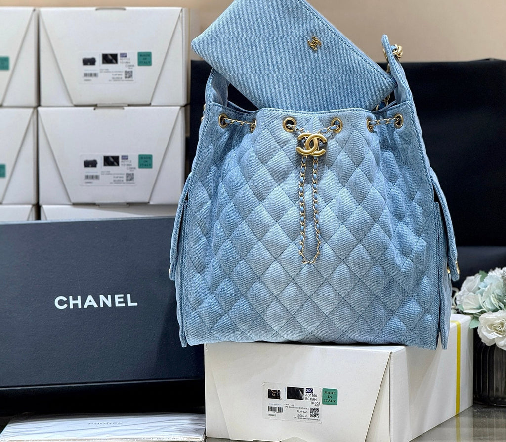 CHANEL 25 HANDBAG 40 IN BLUE DENIM GOLD HARDWARE