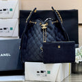 CHANEL 25 HANDBAG 40 IN BLACK DENIM GOLD HARDWARE