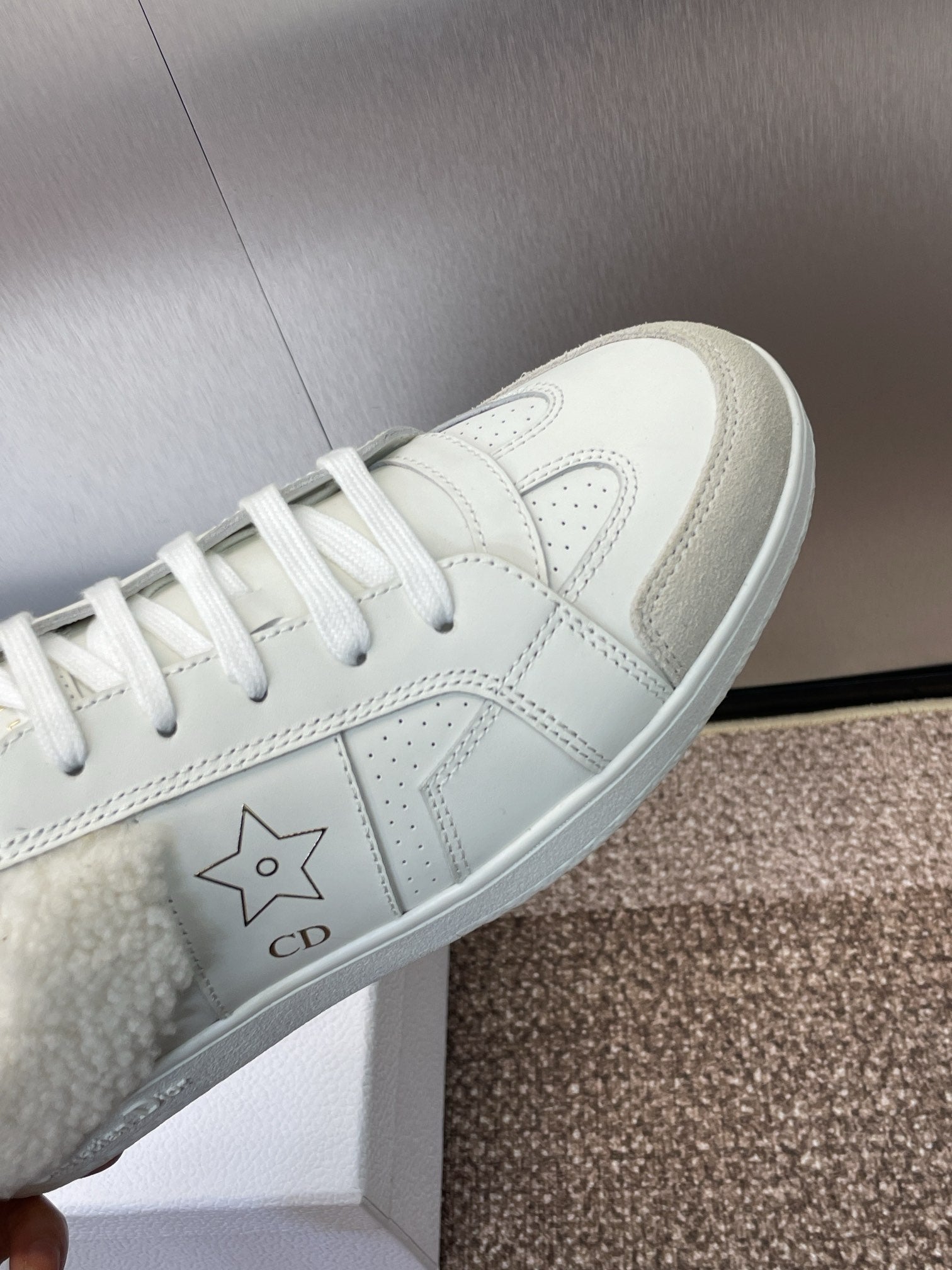 DIOR STAR SNEAKER IN WHITE CALFSKIN AND SHEARLING