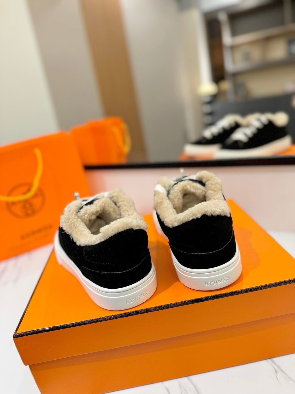 HERMES DAY SNEAKER IN BLACK SUEDE AND FLEECE LINING