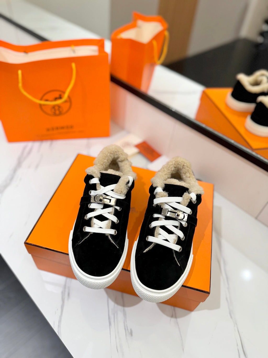 HERMES DAY SNEAKER IN BLACK SUEDE AND FLEECE LINING