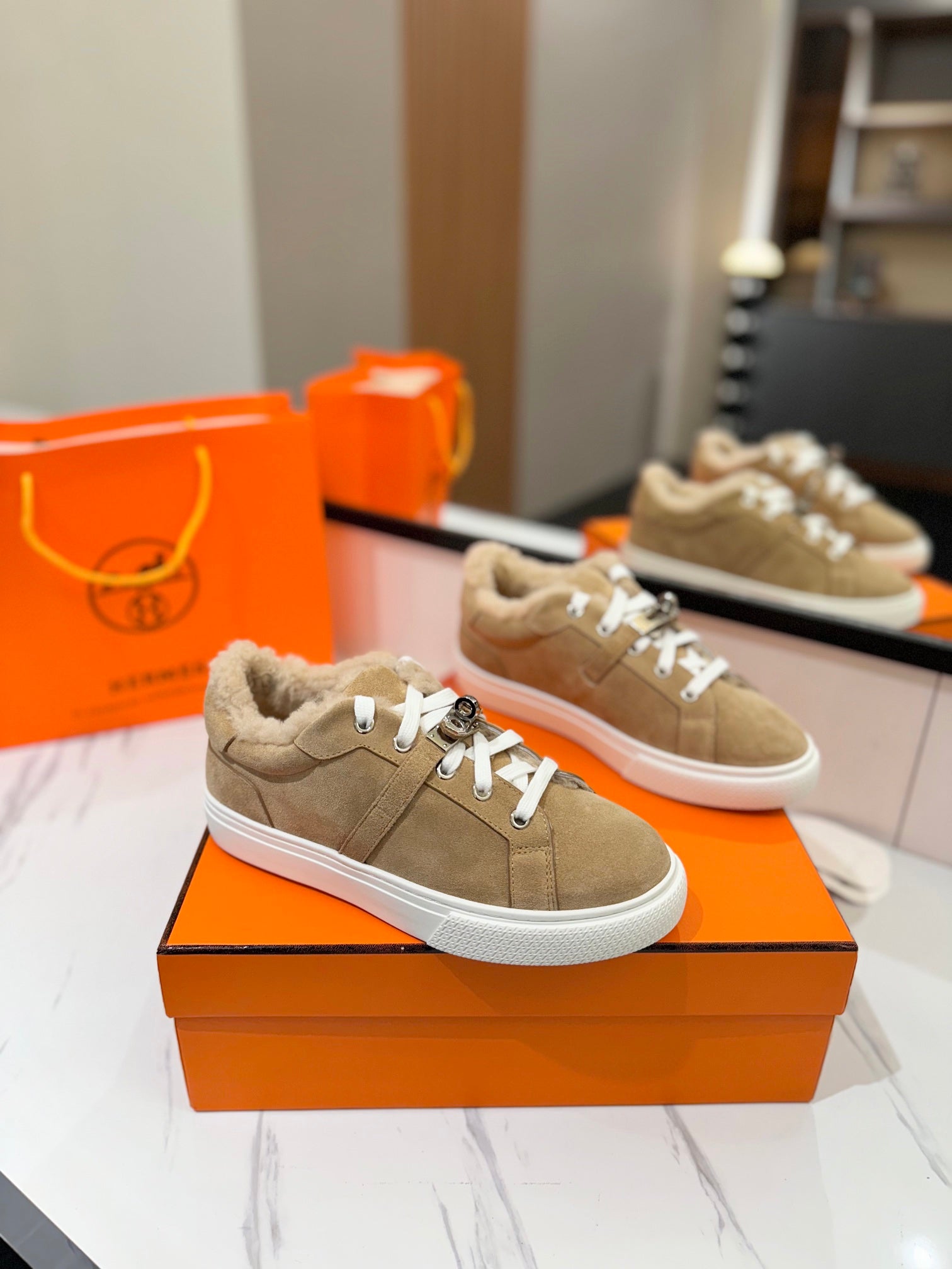 HERMES DAY SNEAKER IN TORTILLA BROWN SUEDE AND FLEECE LINING