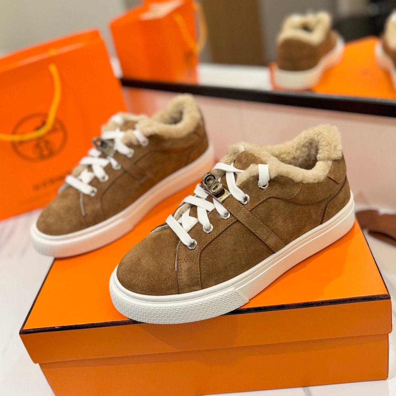 HERMES DAY SNEAKER IN BRONZE BROWN SUEDE AND FLEECE LINING