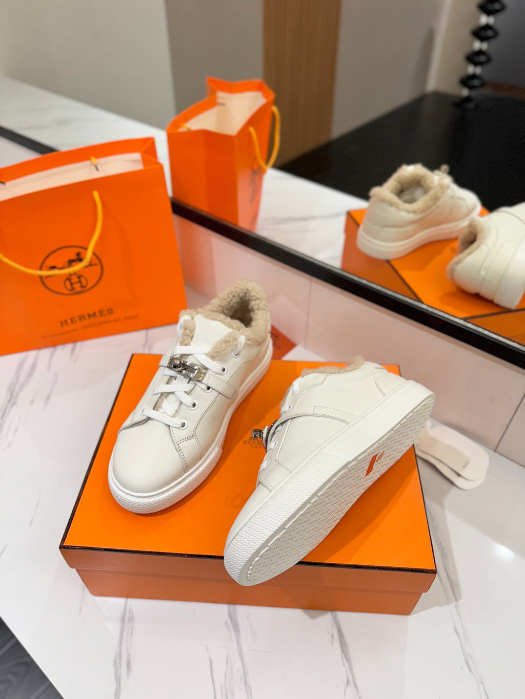 HERMES DAY SNEAKER IN WHITE CALFSKIN AND FLEECE LINING