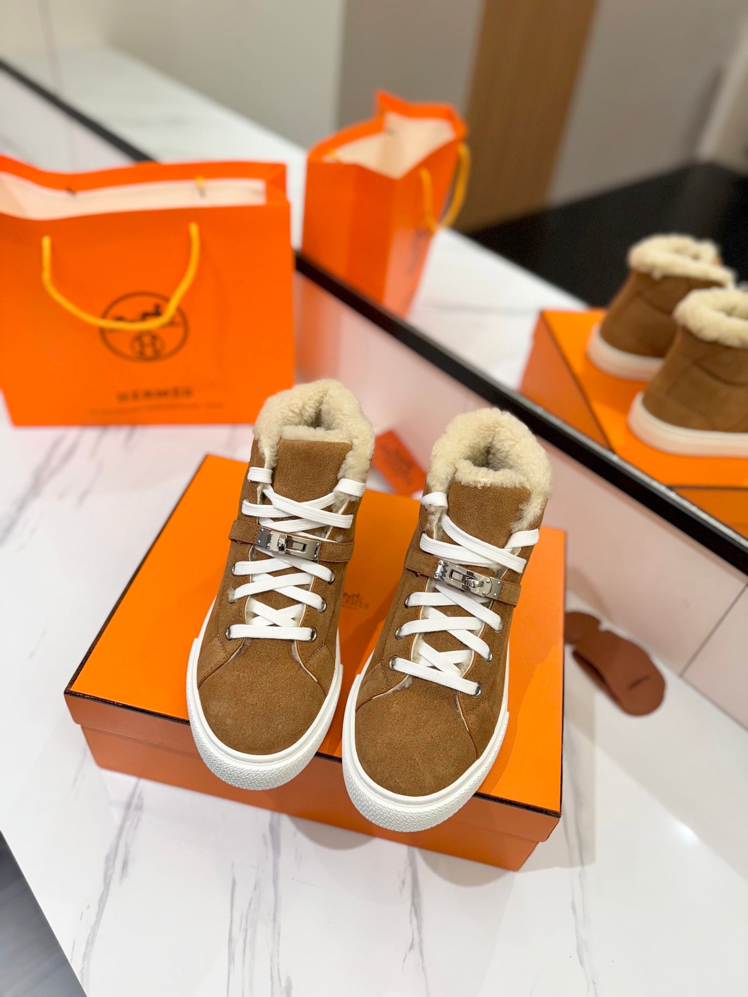 HERMES CHEALSEA BOOTS IN BRONZE BROWN SUEDE AND FLEECE LINING