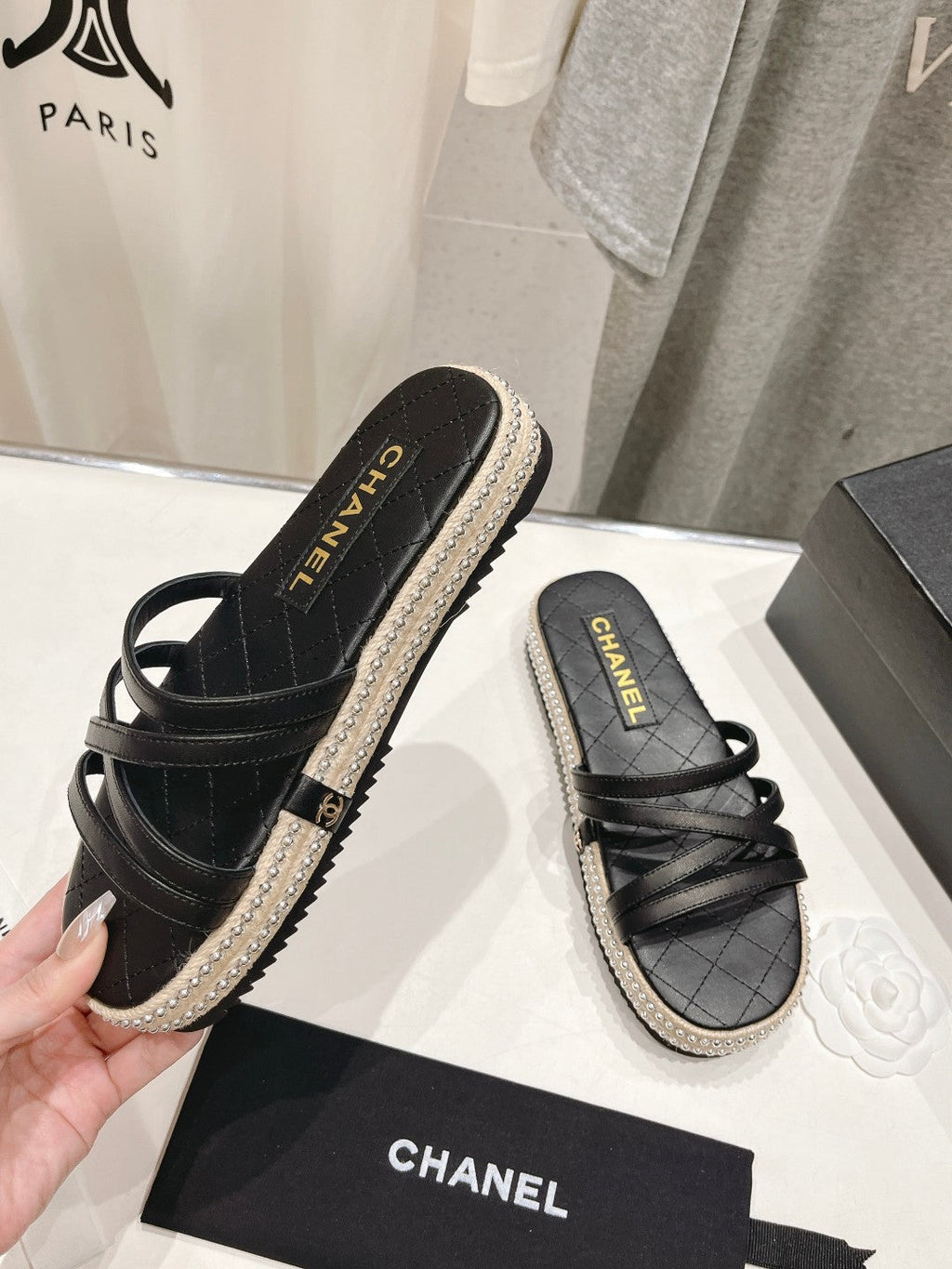 CHANEL SLIPPERS CROSS STRAPS IN BLACK LAMBSKIN