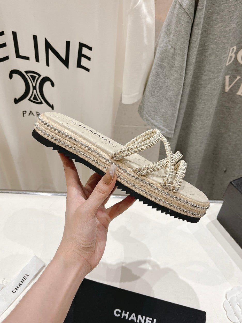 CHANEL WOVEN STRAP SLIPPERS IN WHITE LAMBSKIN