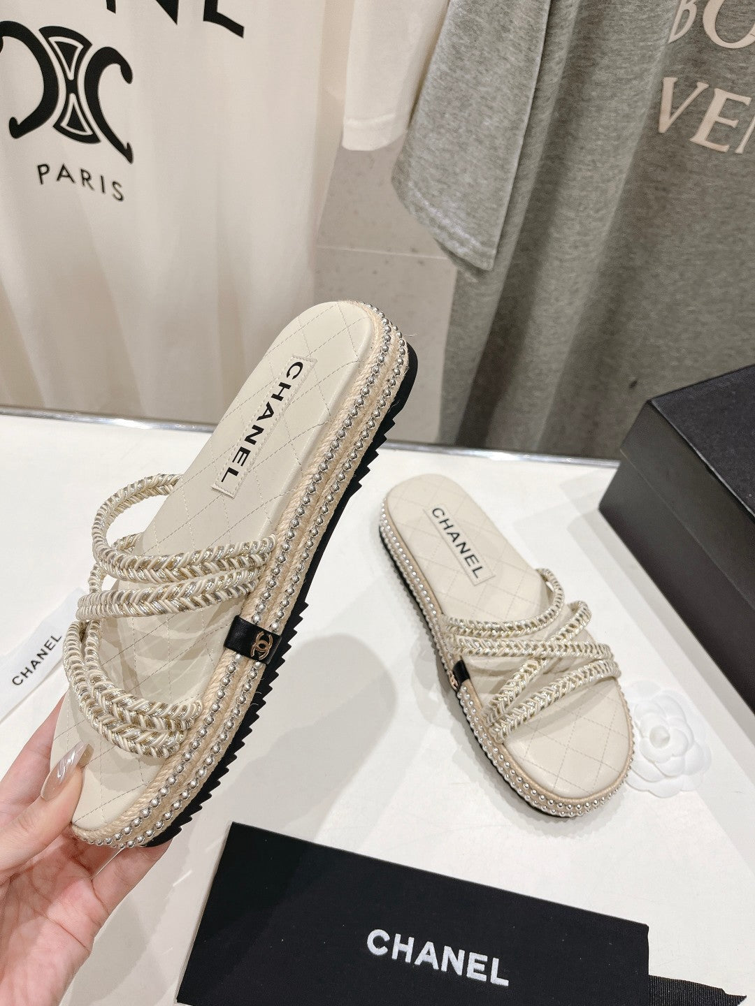 CHANEL WOVEN STRAP SLIPPERS IN WHITE LAMBSKIN
