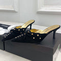 CHANEL HIGH 65 MM MULE IN BLACK SUEDE